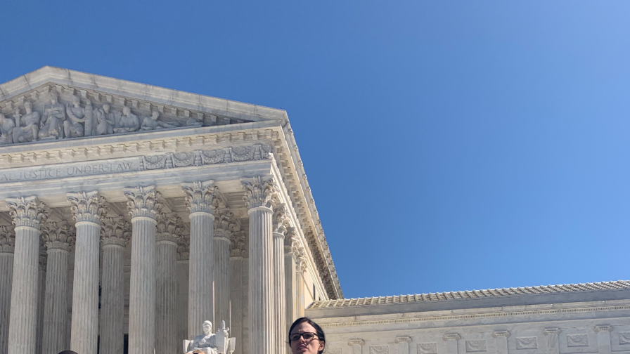 Allison Riggs, Attorney for LWV of North Carolina speaks to press outside the Supreme Court on March 26, 2019