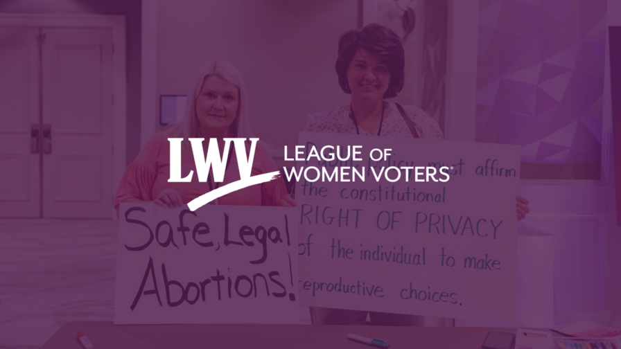 A picture of two women holding reproductive rights protest signs, transparent over a purple background. The LWV logo is in the forefront.
