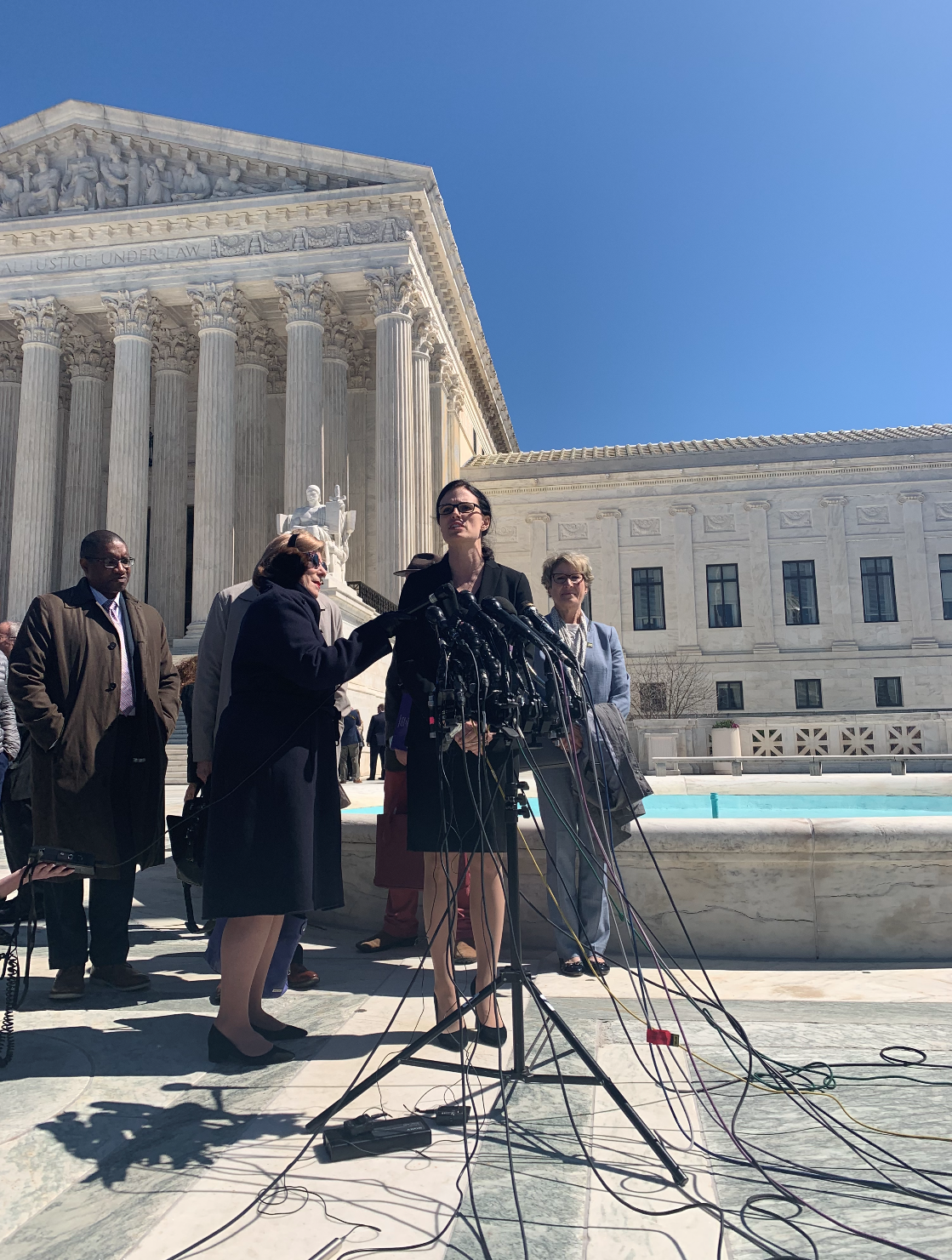 Allison Riggs, Attorney for LWV of North Carolina speaks to press outside the Supreme Court on March 26, 2019