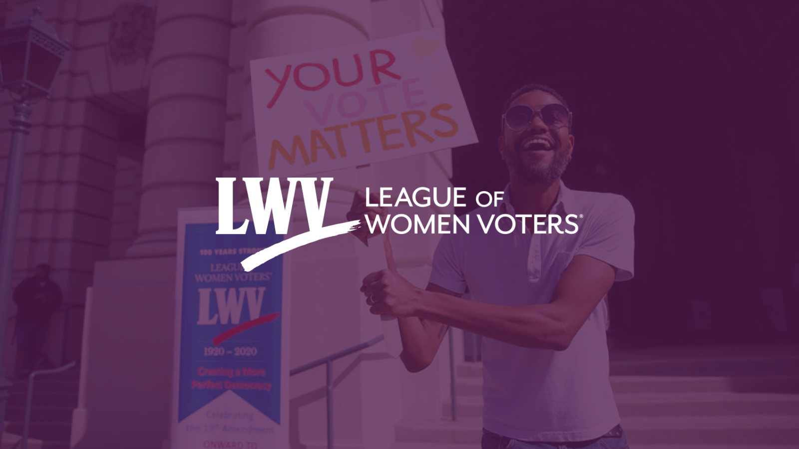 Image of a man holding a sign that says "your vote matters" with a purple overlay. The LWV logo is centered over the image.