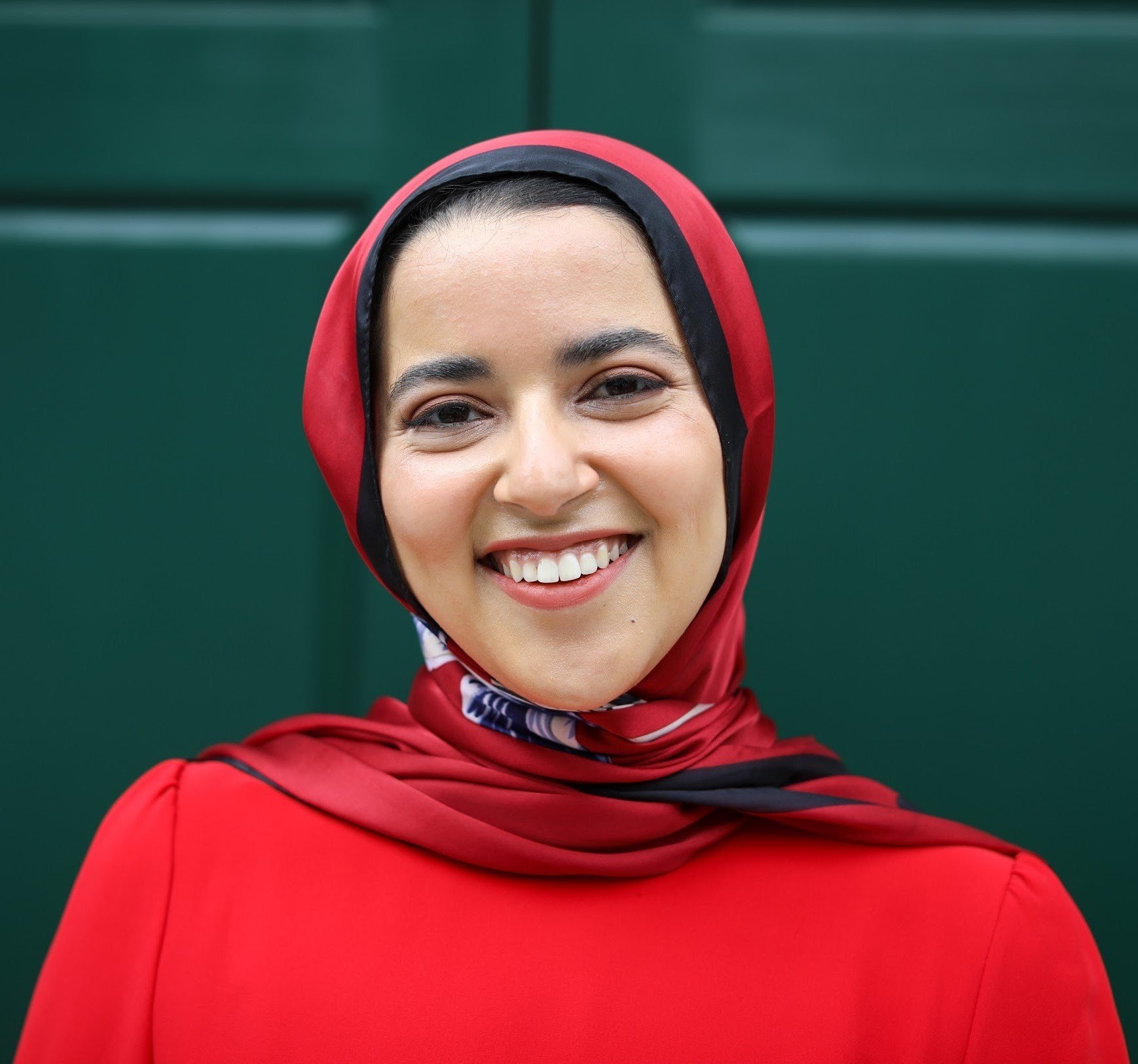 Headshot of legislative and policy coordinator Khadija Ali Amghaiab