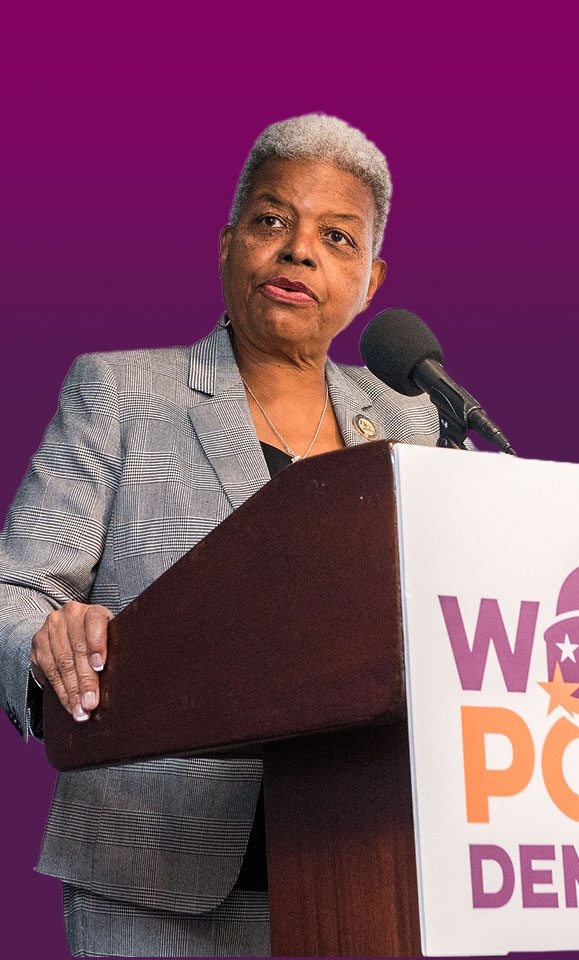 LWV Board President Dr. Turner speaking at a podium