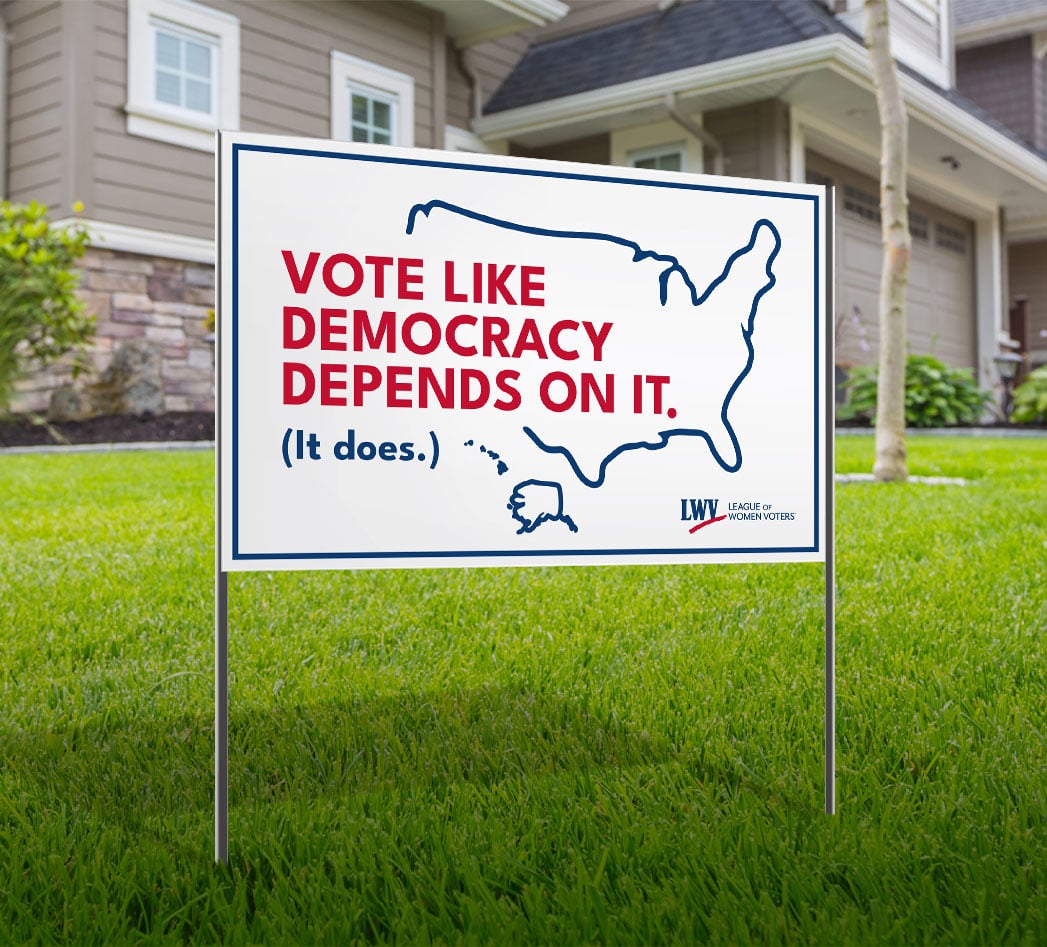 A yard sign that says "Vote like democracy depends on it. It does!"