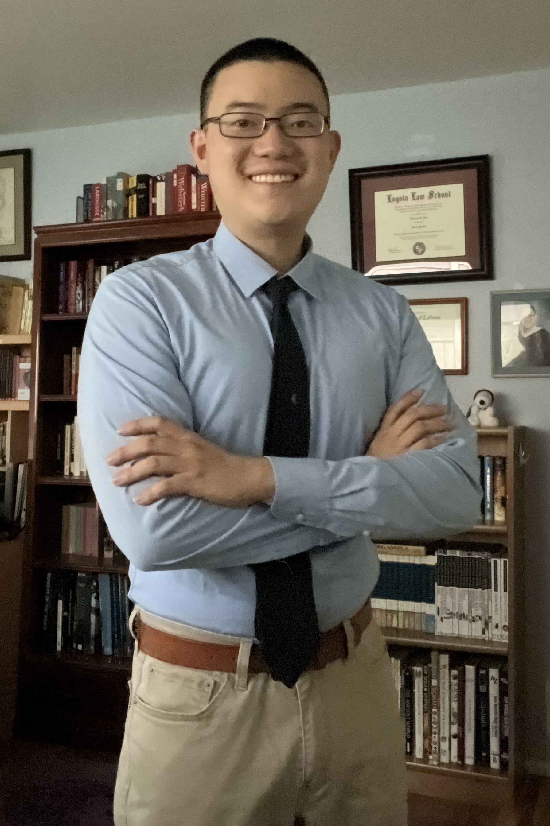 Headshot of Thomas Tai, legal and research fellow