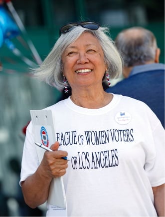 Woman wearing LWV LA shirt