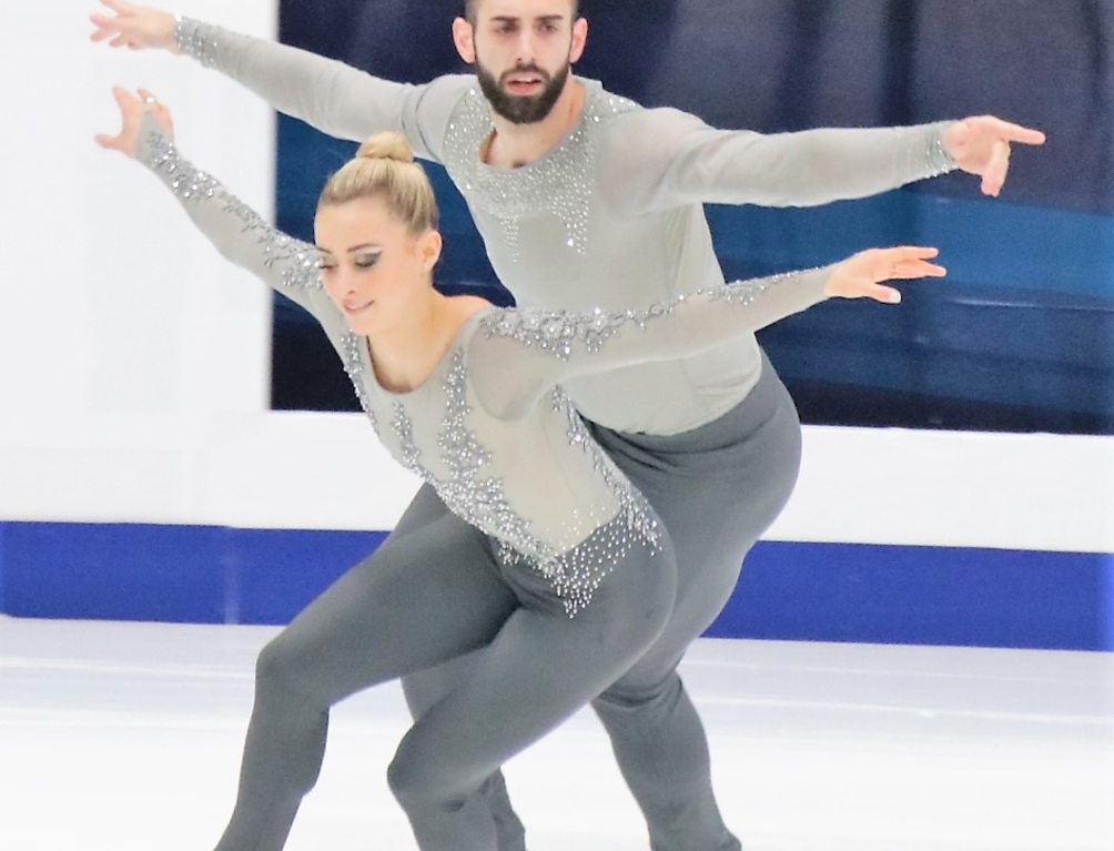 Pair skaters Ashley Cain-Gribble and Timothy Leduc on the ice