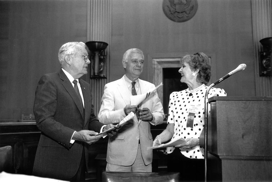 First Vice-President Virginia DeSimone presents Sens. Wendell Ford (D KY) and Mark Hatfiled (R OR), cosponsors of the National Voter Registration Act with motor voter petitions from their home states