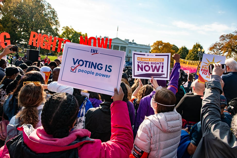 Activists at an action for No More Excuses