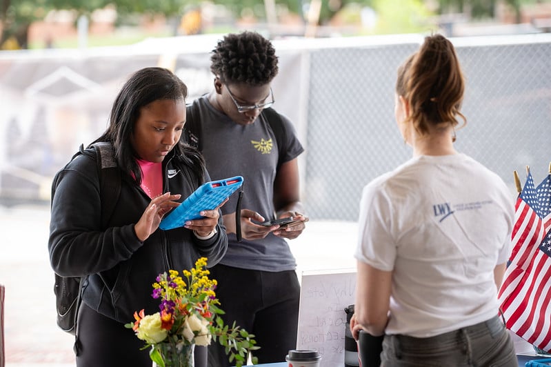 Students registering to vote with a Kansas League