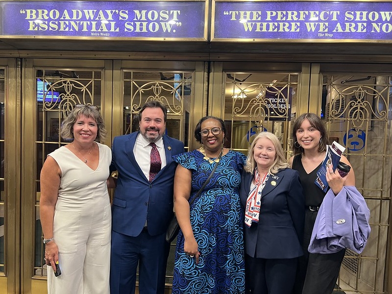 LWV members, including CEO Celina Stewart and President Dianna Wynn, in front of the theater for Broadway's "Suffs"