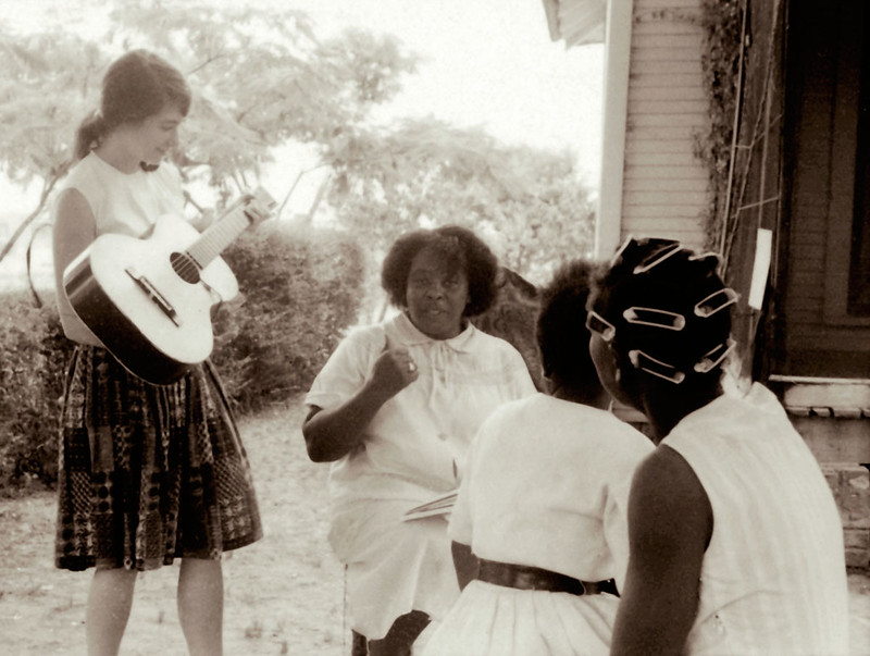 Fannie Lou Hamer with women, including activist Heather Booth