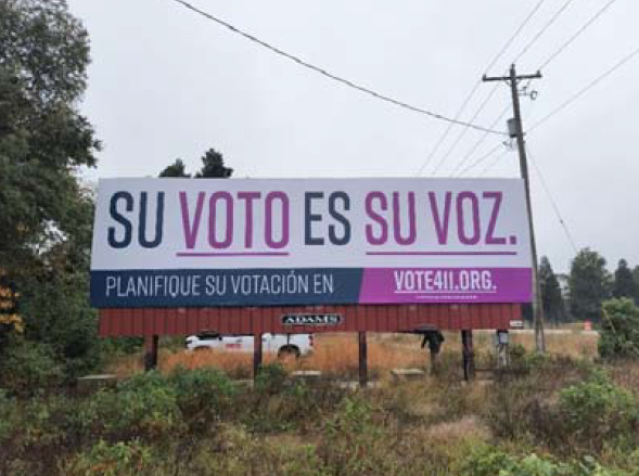 VOTE411 billboard saying "Su voto es su voz"