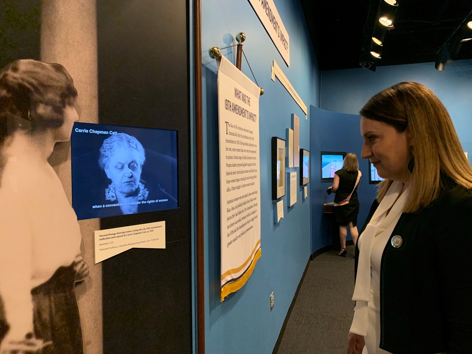 LWVUS CEO Virginia Kase watches newsreel footage of LWV founder Carrie Chapman Catt