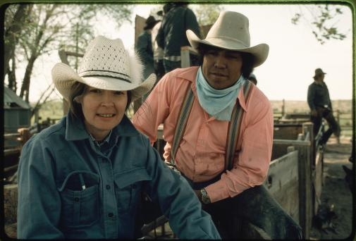 Two Native people in cowboy hats