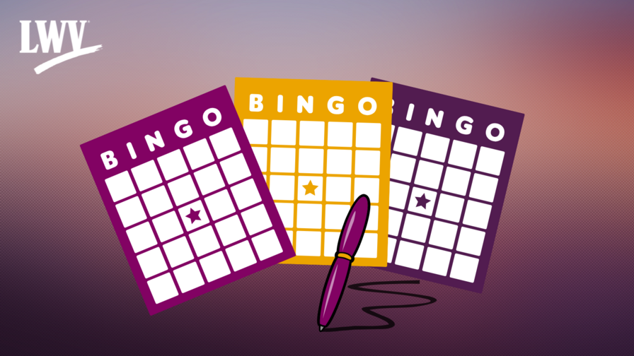 Three bingo cards with a pen beneath them