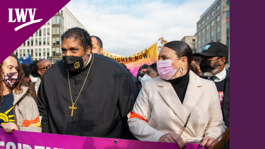 Bishop Barber and Virginia Kase Solomón at a voting rights rally