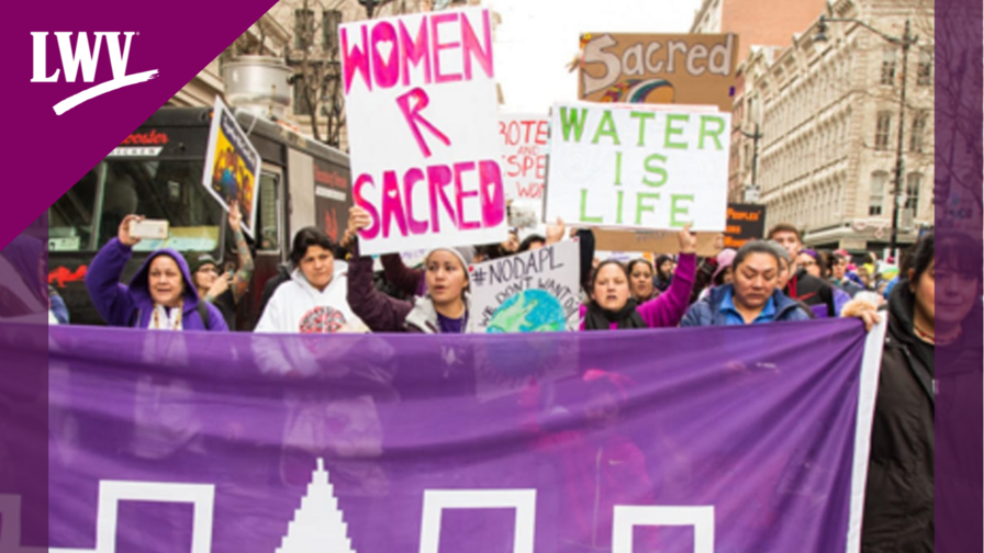 Haudenosaunee women marching in protest