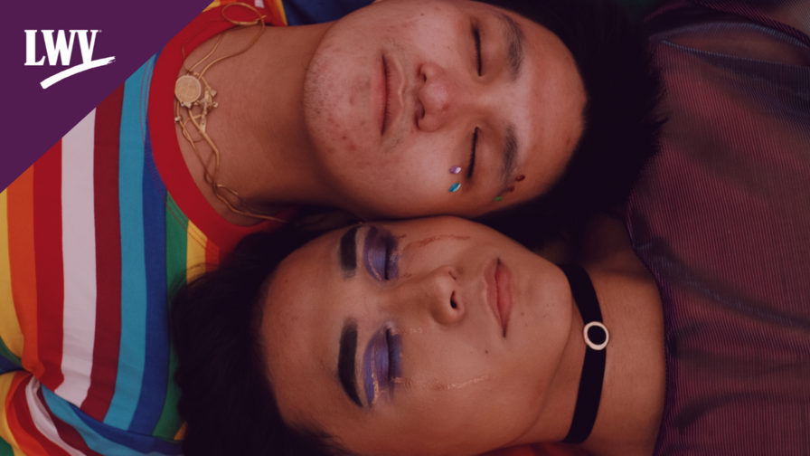 Two people lying side by side with their eyes closed