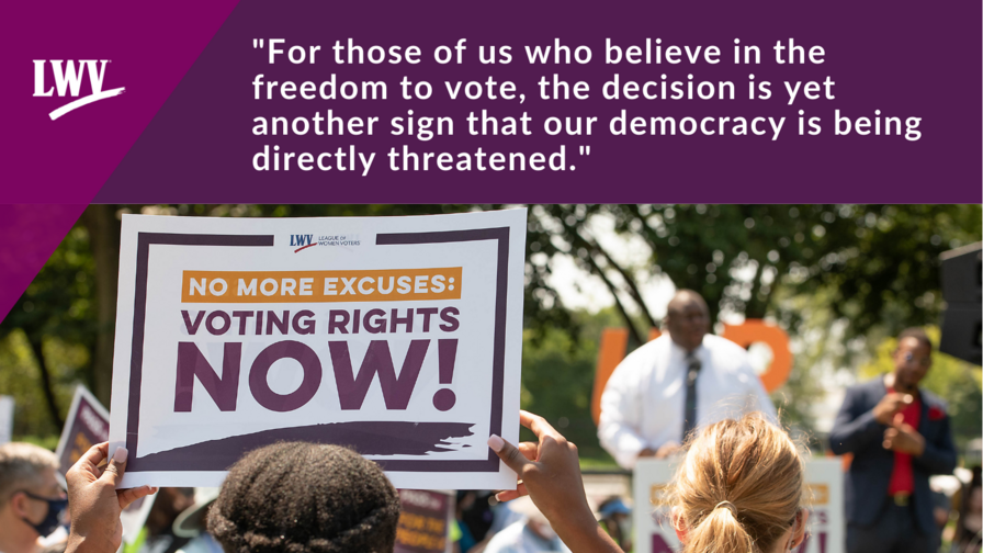 The quote ""For those of us who believe in the freedom to vote, the decision is yet another sign that our democracy is being directly threatened" above a woman holding a sign saying "No More Excuses, Voting Rights Now"