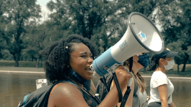 Person holding a megaphone - Action Kit