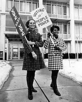 Vote baby vote women with signs